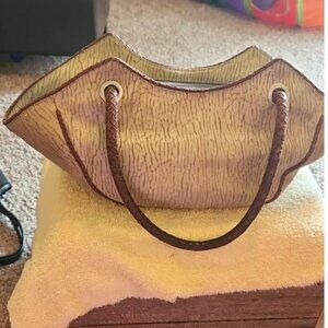 Sondra Roberts crescent shaped leather handbag